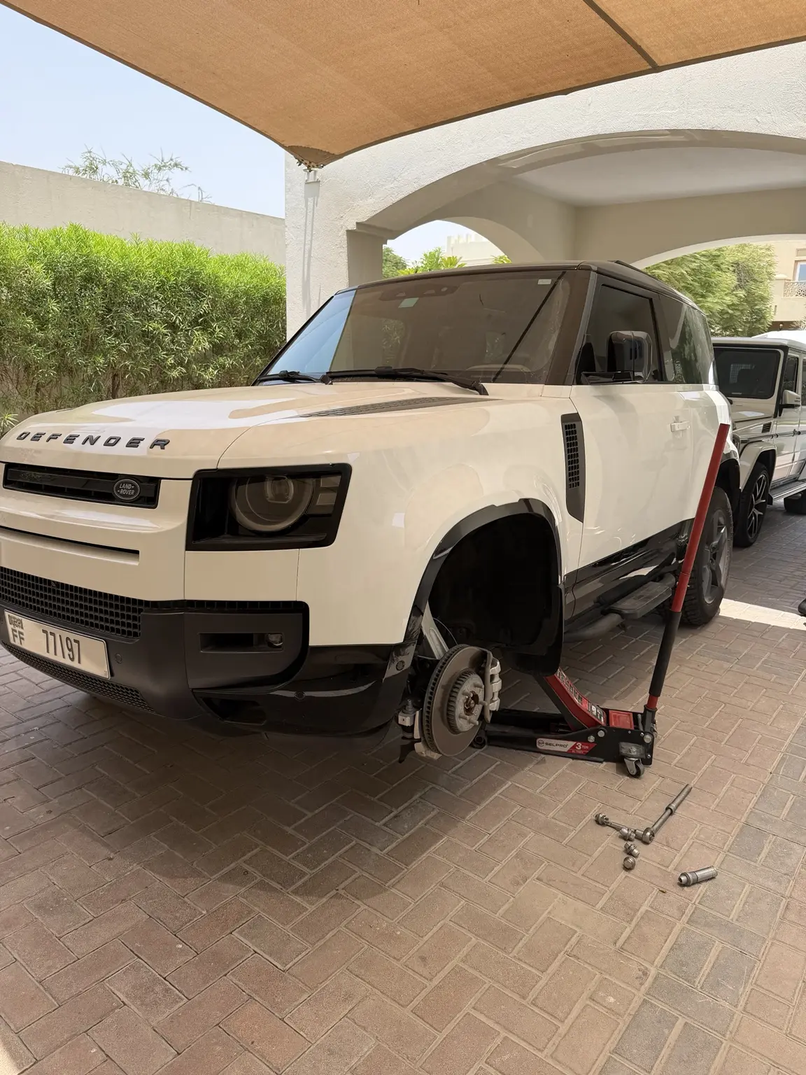 Mobile tyre fitting during a hot day in Dubai